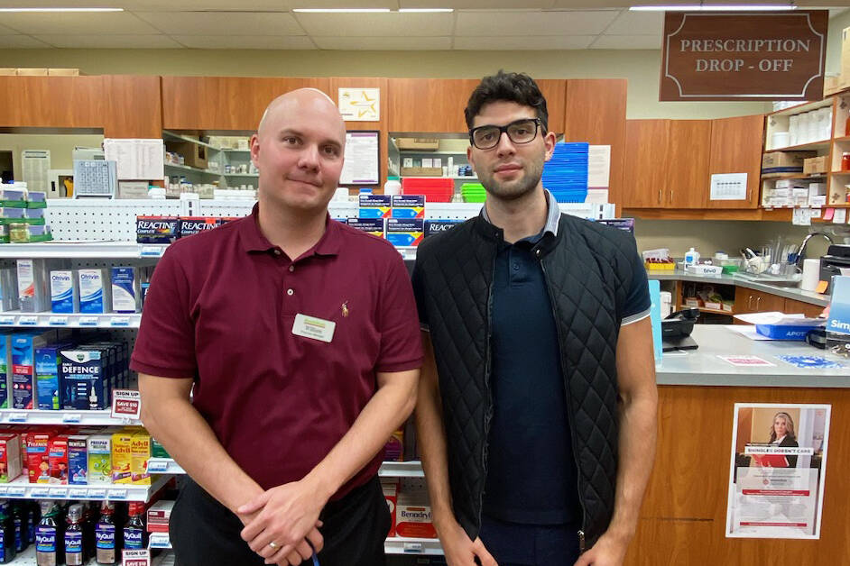 William Poggemiller, left, Managing Partner of Rimbey Guardian Drug Mart, is leaving the pharmacy for a new job with Alberta Health Services. Interim pharmacist John Minkov, right, will be working alonside prescribing pharmacist Emily Wong until a permanent replacement is found. Leah Bousfield photo.