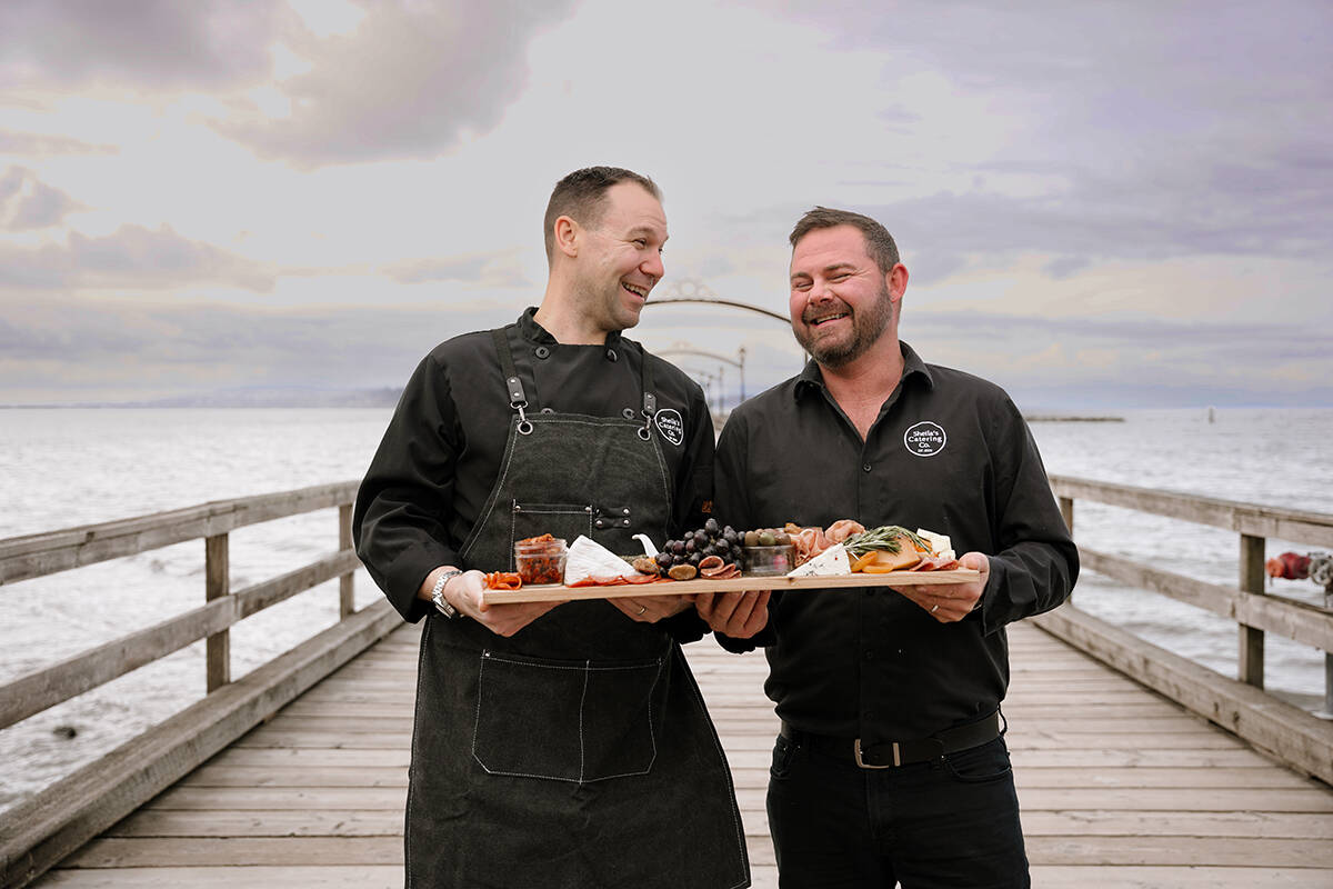 Sheila’s Catering owners Wes Levesque, left, and Brant Darling have thought of everything ahead of Sept. 2’s Charcuterie on the Pier, including scaring off seagulls and keeping food fresh!