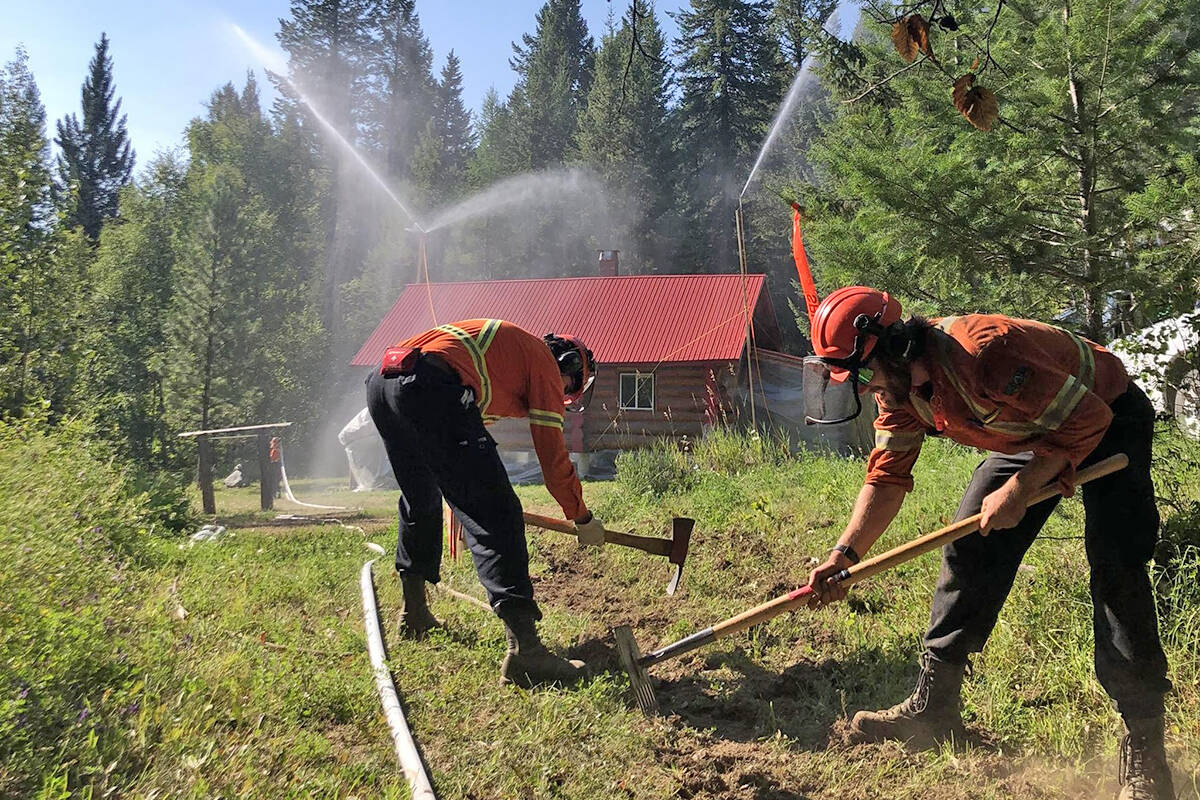 Osprey Forest Operations Ltd. working to protect a structure during this summer's wildfires. Structural protection from wildfires is most effective if your property is already FireSmart prepared. submitted by client