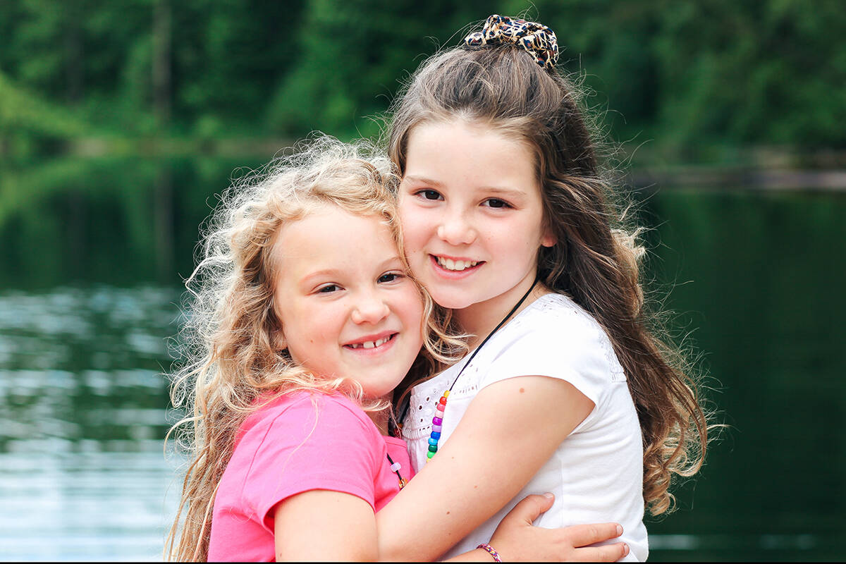 Natalia and Annabel at Canadian Cancer Society's Camp Goodtimes in 2016. The annual Cops for Cancer Tour de Rock raises funds for childhood cancer research and support services like Camp Goodtimes. submitted